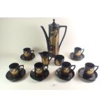 A Portmeirion Phoenix coffee set comprising coffee pot, milk, sugar and six cups and saucers