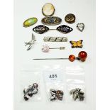 A box of vintage brooches and buttons etc