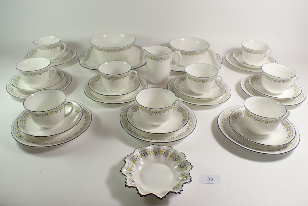 A 1920's Shelley porcelain tea set in the Bell pattern (no. 11233), comprising 9 trios, 2 cake - Image 2 of 2