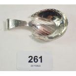 A Georgian silver caddy spoon with engraved decoration, Birmingham 1809