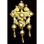A Victorian 18 ct gold pendant and similar single earring with leaf and flower decoration set pearls