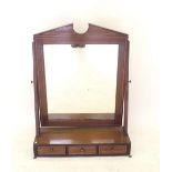 A fine Edwardian mahogany large toiletry mirror on a box base with crossbanding and three drawers.