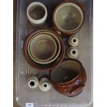 A group of stoneware bottles and tureens etc