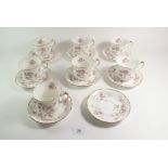 A set of seven Paragon 'Victorious Rose' cups and saucers