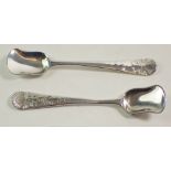 A pair of Georgian shovel form silver salt spoons with shell terminals, London 1832 & 1830?