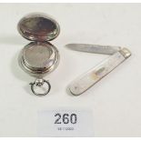 A silver sovereign case Birmingham 1913 and a silver and mother of pearl and silver fruit knife,