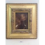 A 19th century Crystoleum of a woman in decorative gilt frame, total size 25.5 cm x 28cm