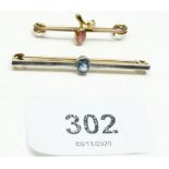 A 14ct yellow and white gold Art Deco bar brooch set with aquamarine together with a 9ct gold