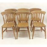 A set of six farmhouse style slat back pine kitchen chairs