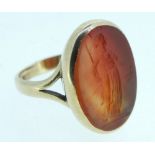 A 19th century gold ring with carved intaglio, 6.4g, size O