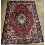A multicolour vintage Persian Tabriz carpet, 260 x 183 cm