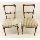 A pair of Edwardian bar back bedroom chairs