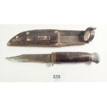 A late 19th/early 20thC hunting knife with turned handle and leather sheath, marked on the base of