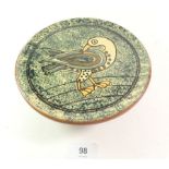 A studio pottery footed plate with bird decoration by Anne Wrightson, 18cm diameter