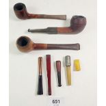 A selection of various smoking pipes and cheroot holders.