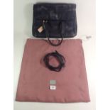 A Radley navy blue handbag with cloth bag and detachable shoulder strap