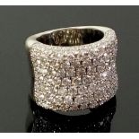 A vintage white gold diamond set cocktail ring with wide band set 3.5 cts of diamonds, size M to
