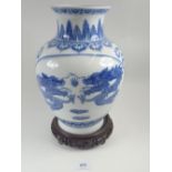 A Chinese blue and white vase painted dragon 32cm tall