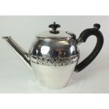 An Arts & Crafts silver bachelor teapot, London 1918, by Sandheim Brothers, 430g