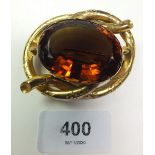 A Victorian Pinchbeck brooch, set orange stone, 6 x 5 cm