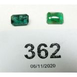 Two cushion cut emeralds, 2.6 cts