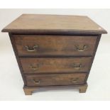 A stained wood Georgian style small chest of three drawers, 64 x 42 x 67cm