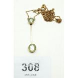 An Edwardian 9 ct gold aquamarine pendant double drop necklace, 2.5 gm