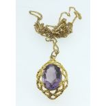 A 9 carat gold pendant set amethyst on 9 carat gold chain