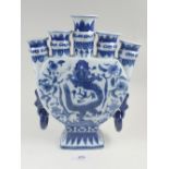 A large Chinese blue and white tulip vase with dragon decoration, 30cm tall
