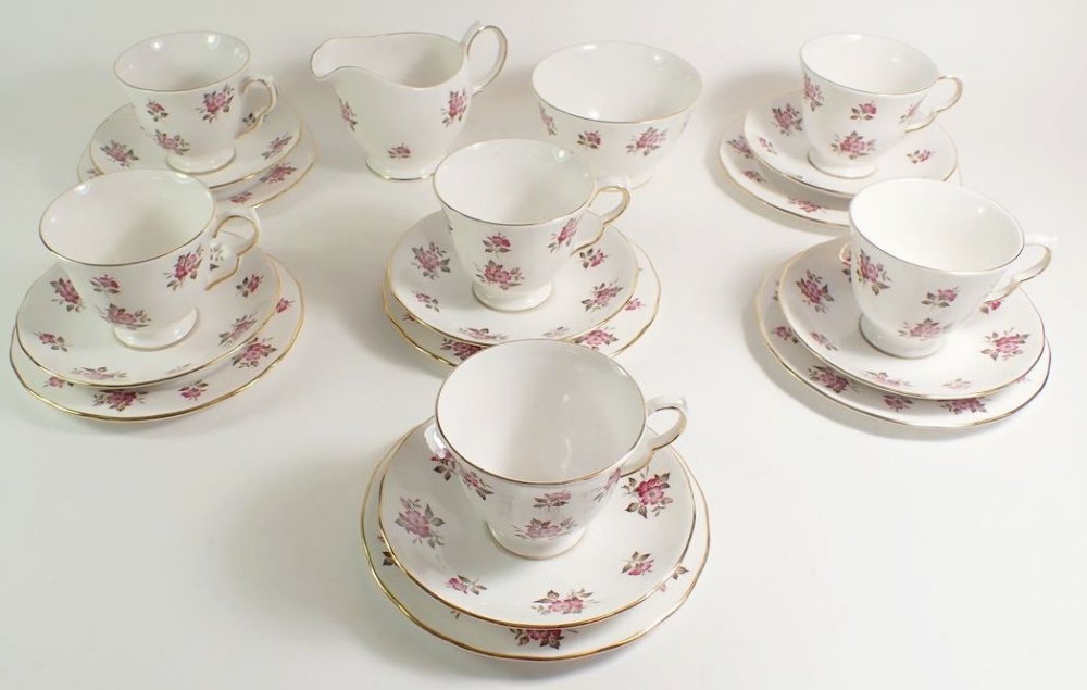 A Queen Anne vintage tea service comprising: six cups and saucers, six tea plates, jug and sugar