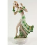 An Art Deco 1930's German porcelain figure of a flapper girl. 15.5cm.