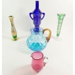 A selection of coloured glassware to include a cranberry glass jug etc.