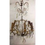 A mid 20th century French five branch cut glass and gilt metal chandelier