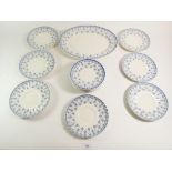 A set of Spode Fleur de Lys dinner ware comprising:- nine tea plates, seven saucers and a meat plate