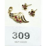 A pair of 9 ct gold and ruby earrings and a matching pendant