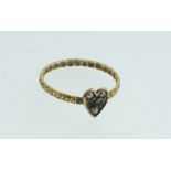 A Victorian 9 ct gold heart form ring set seed pearls on floral worked band, size M (two pearls