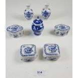 Two pairs of miniature Chinese blue and white boxes and a set of three miniature vases