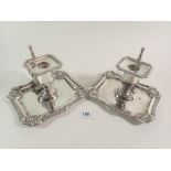 A pair of Victorian silver plated chamber sticks