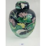 A 19th century Chinese Wang Bing Rong Famille Noir ginger jar with raised stork, flowers decoration,