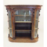 A Victorian fine walnut upright credenza with glazed drop front enclosing pair of shelves over two