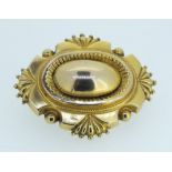 A Victorian gold oval brooch with locket back (vacant) total weight 6.6g (unmarked but tested gold)