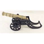 A Victorian brass and cast iron cannon, 47cm