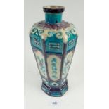 A 19th century Chinese Fahua vase with turquoise panelled decoration, 27cm tall