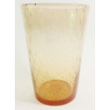 A Whitefriars amber glass bubbled vase - 23 cm.