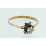 An 18 carat gold ring set diamond in flower form setting, size P