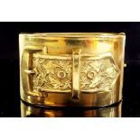 A Victorian gilt metal wide hinged bangle with buckle decoration, 38 cm wide