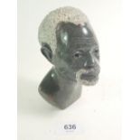 An African stone carved bust of a tribal man signed by O. Musiyawa of the Zimbabwean Shona School,