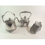 A silver plated biscuit barrel, sugar scuttle and tea kettle (no stand)