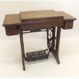 A Singer treadle sewing machine on oak table