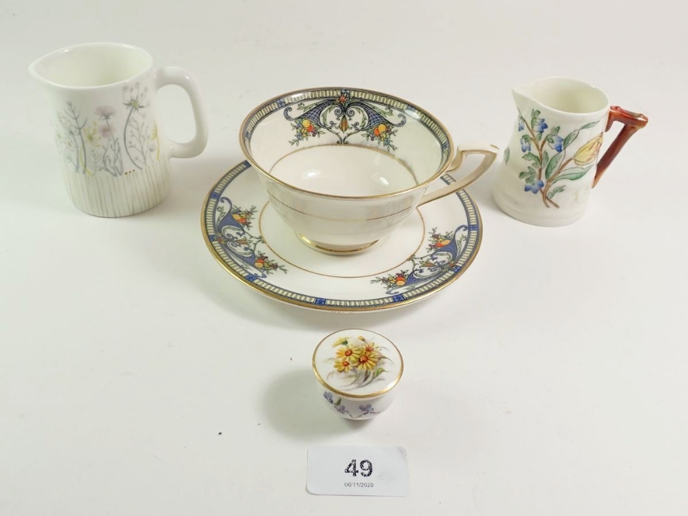 A Royal Worcester cup and saucer, a Worcester cream jug, matched pot and cover etc